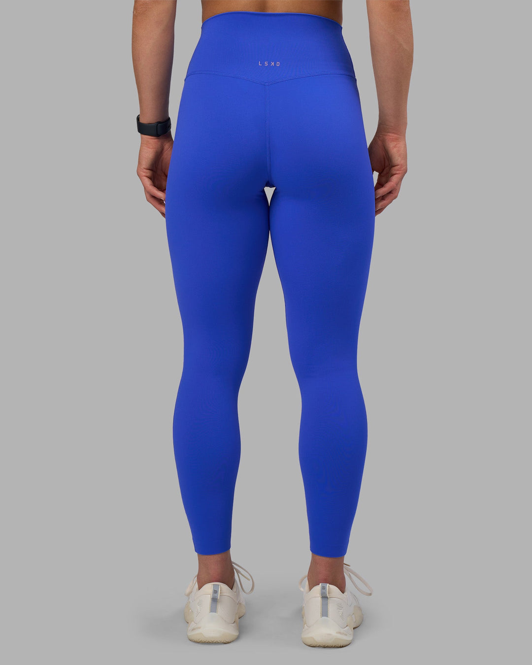 Woman wearing Elixir Ultra High-Rise Full Length Legging - Power Cobalt | Model:Keisha | Size:S