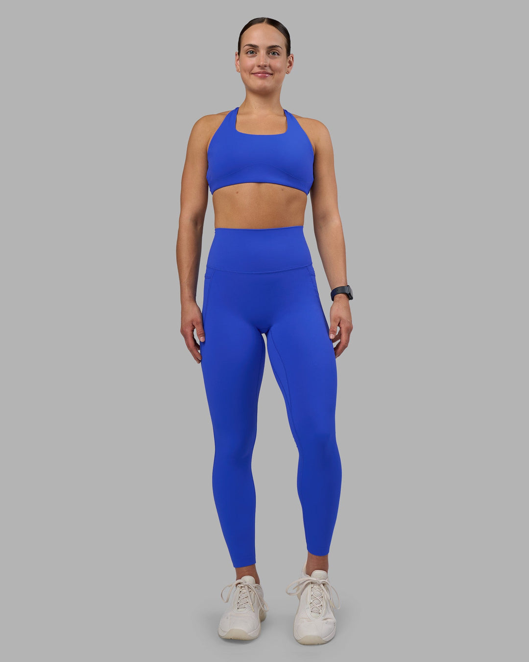 Woman wearing Elixir Ultra High-Rise Full Length Legging - Power Cobalt | Model:Keisha | Size:S
