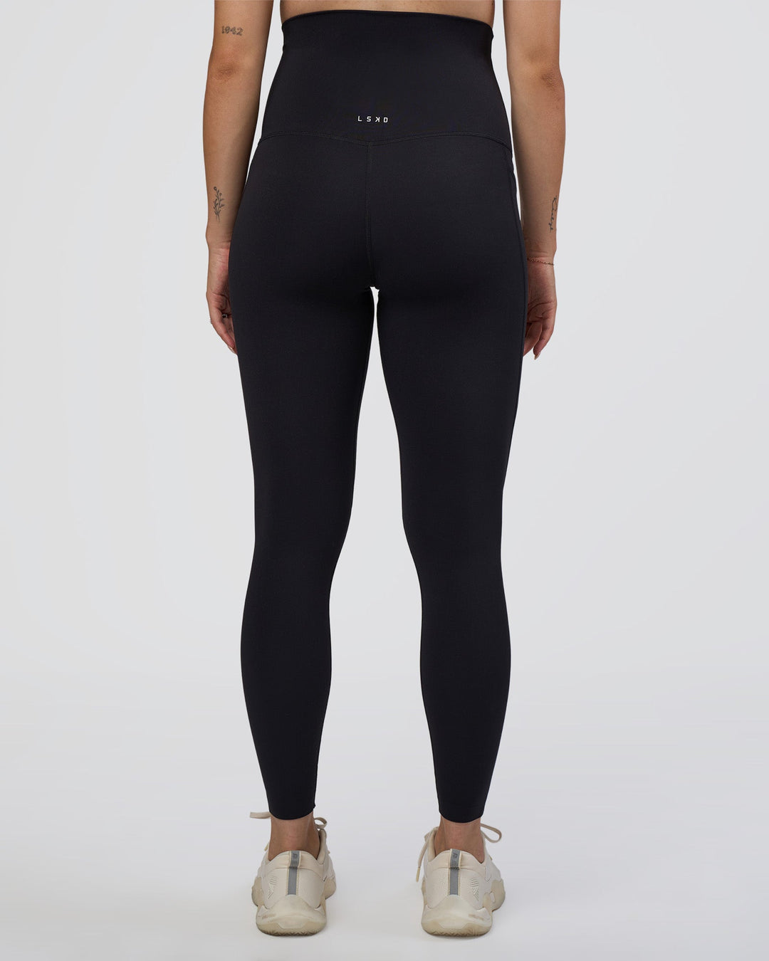 Woman wearing Elixir Ultra High-Rise Maternity Full Length Legging Pockets - Black | Model:Kitahna | Size:S