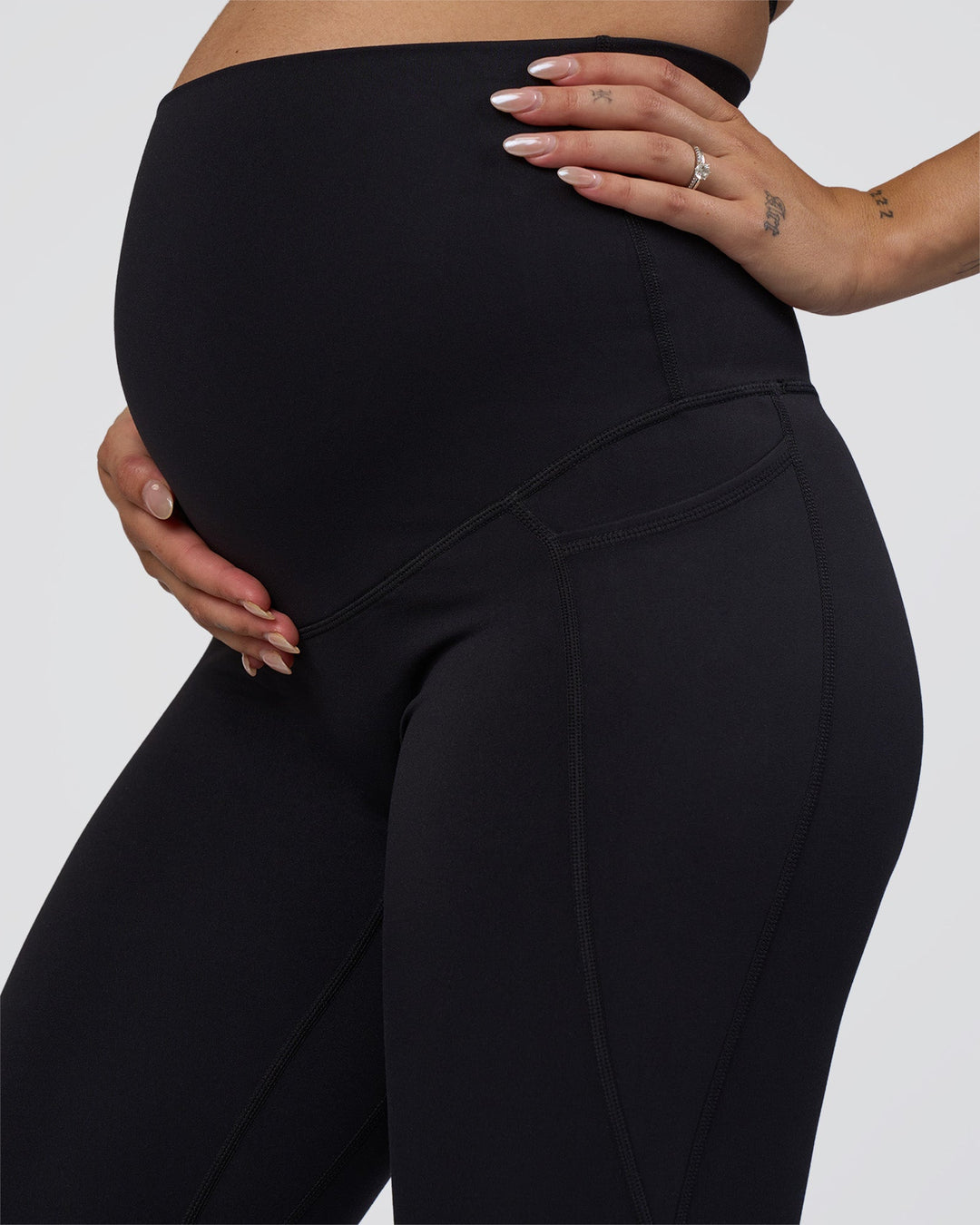 Woman wearing Elixir Ultra High-Rise Maternity Full Length Legging Pockets - Black | Model:Kitahna | Size:S