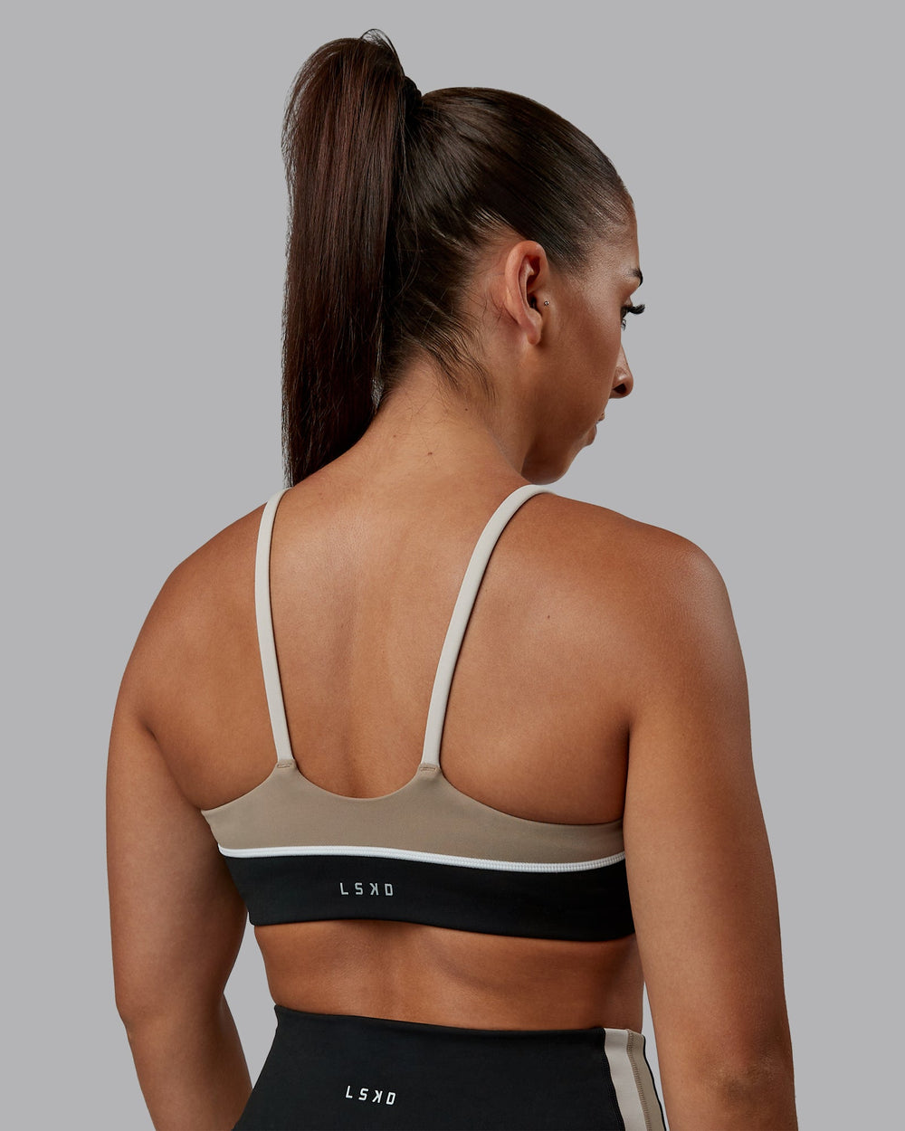 Woman wearing Embrace Sports Bra - Black-Multi| Model:Tylah | Size:S