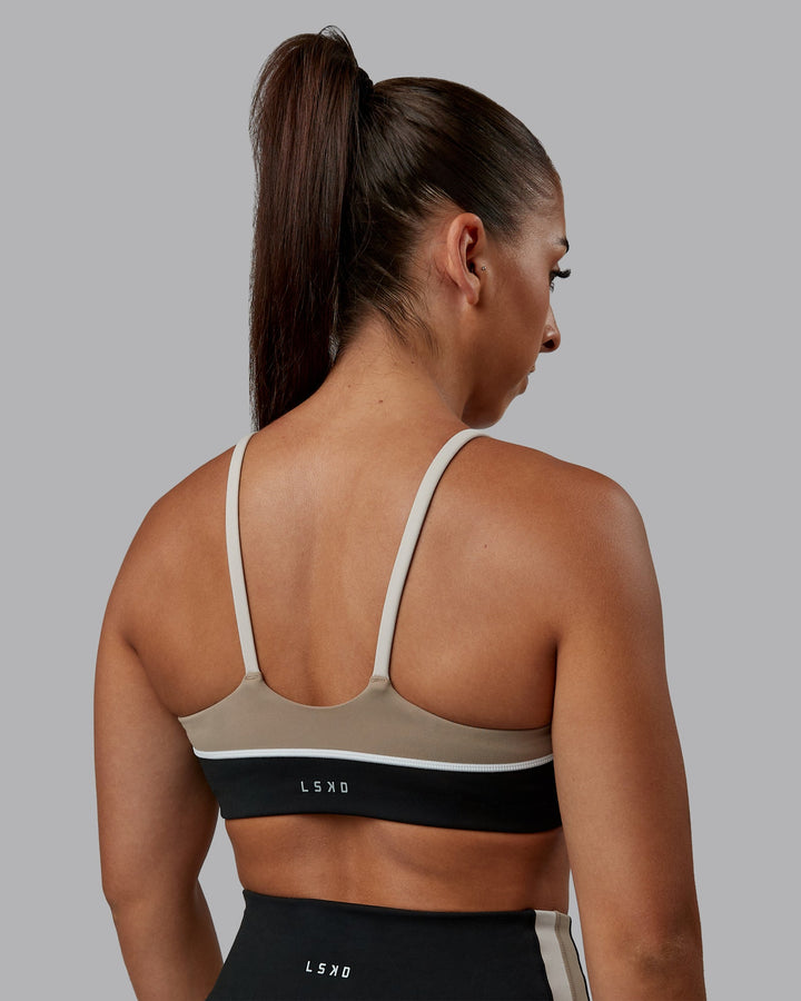 Woman wearing Embrace Sports Bra - Black-Multi| Model:Tylah | Size:S
