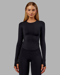 Woman wearing Embrace Thermal Long Sleeve Tee - Black | Model:Ella | Size:S