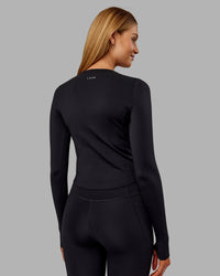 Woman wearing Embrace Thermal Long Sleeve Tee - Black | Model:Ella | Size:S