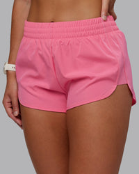 Woman wearing Energy 1.8" Training Short in Pink Lemonade | Model:Lyss | Size:S