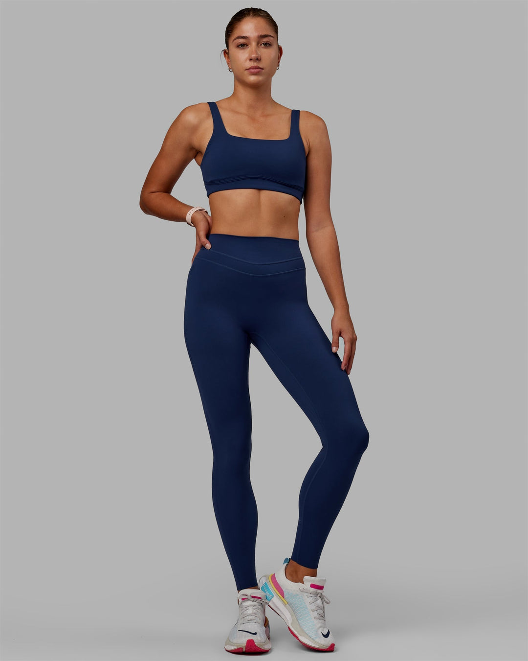 Woman wearing Enhance Full Length Leggings - Midnight Blue