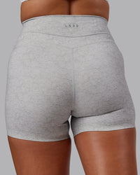 Woman wearing Enhance Ultra High-Rise 4" Short - Grey Marl | Model:Phoebe | Size:S