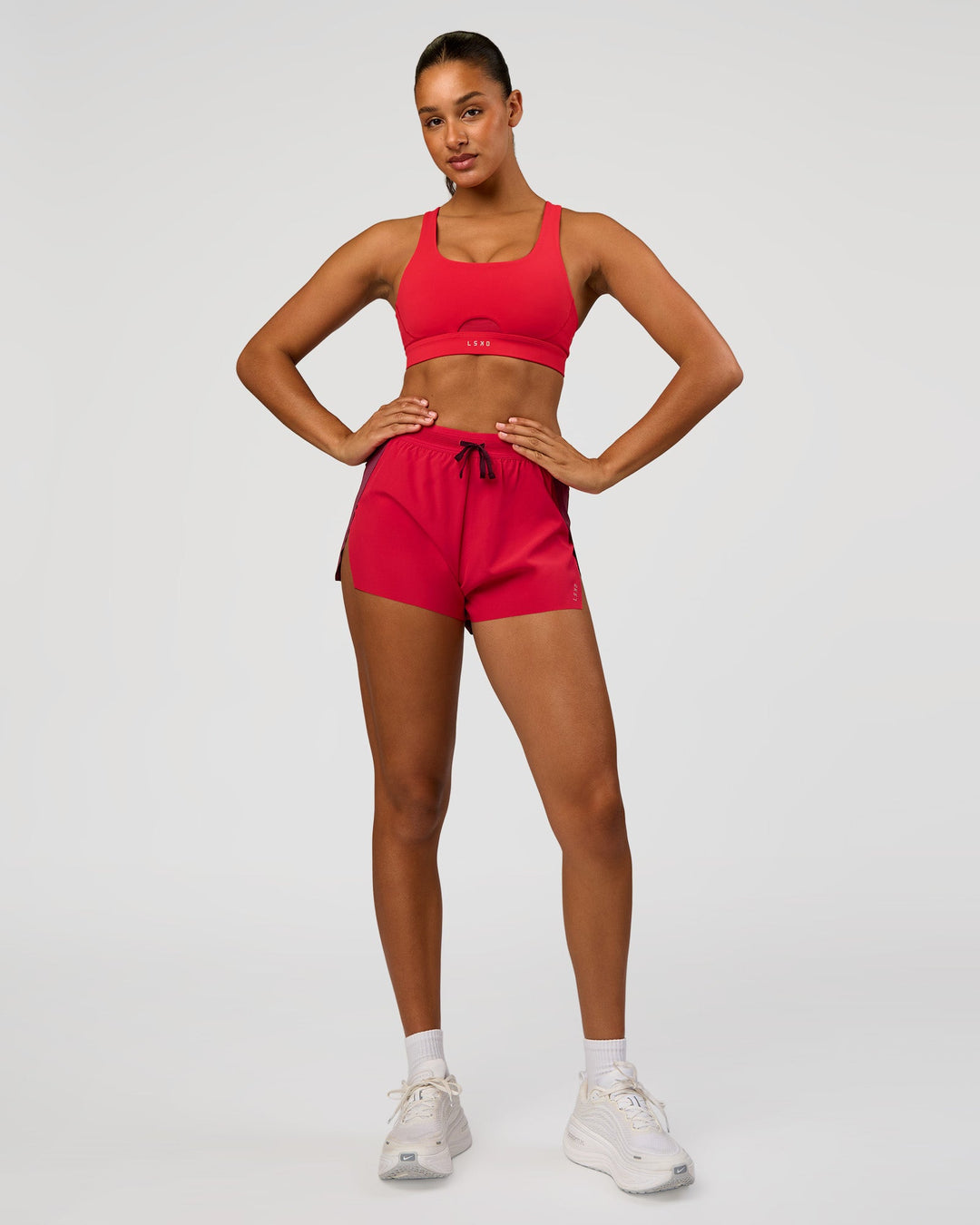 Woman wearing Fast Track Sports Bra Scarlet | Model:Bianca | Size:S |