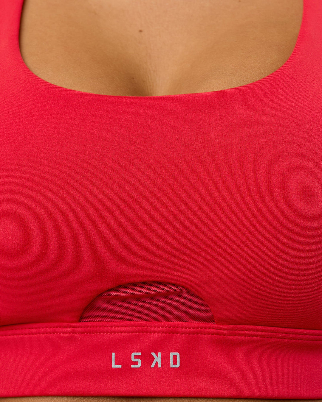 Woman wearing Fast Track Sports Bra Scarlet | Model:Bianca | Size:S |