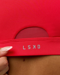Woman wearing Fast Track Sports Bra Scarlet | Model:Rosie | Size:S |