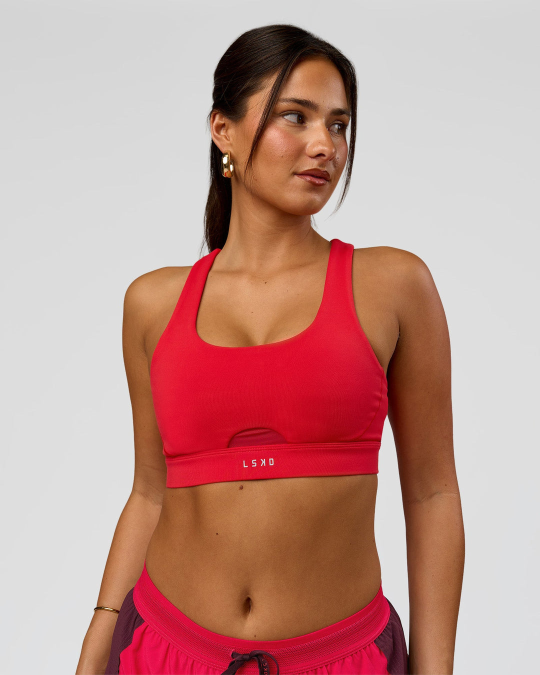 Woman wearing Fast Track Sports Bra Scarlet | Model:Bianca | Size:S |