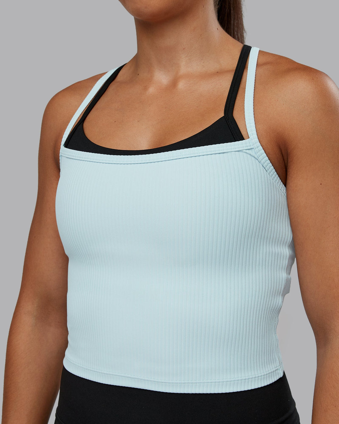 Woman wearing Flame Ribbed Tank in Skyride | Size:S | Model:Tylah