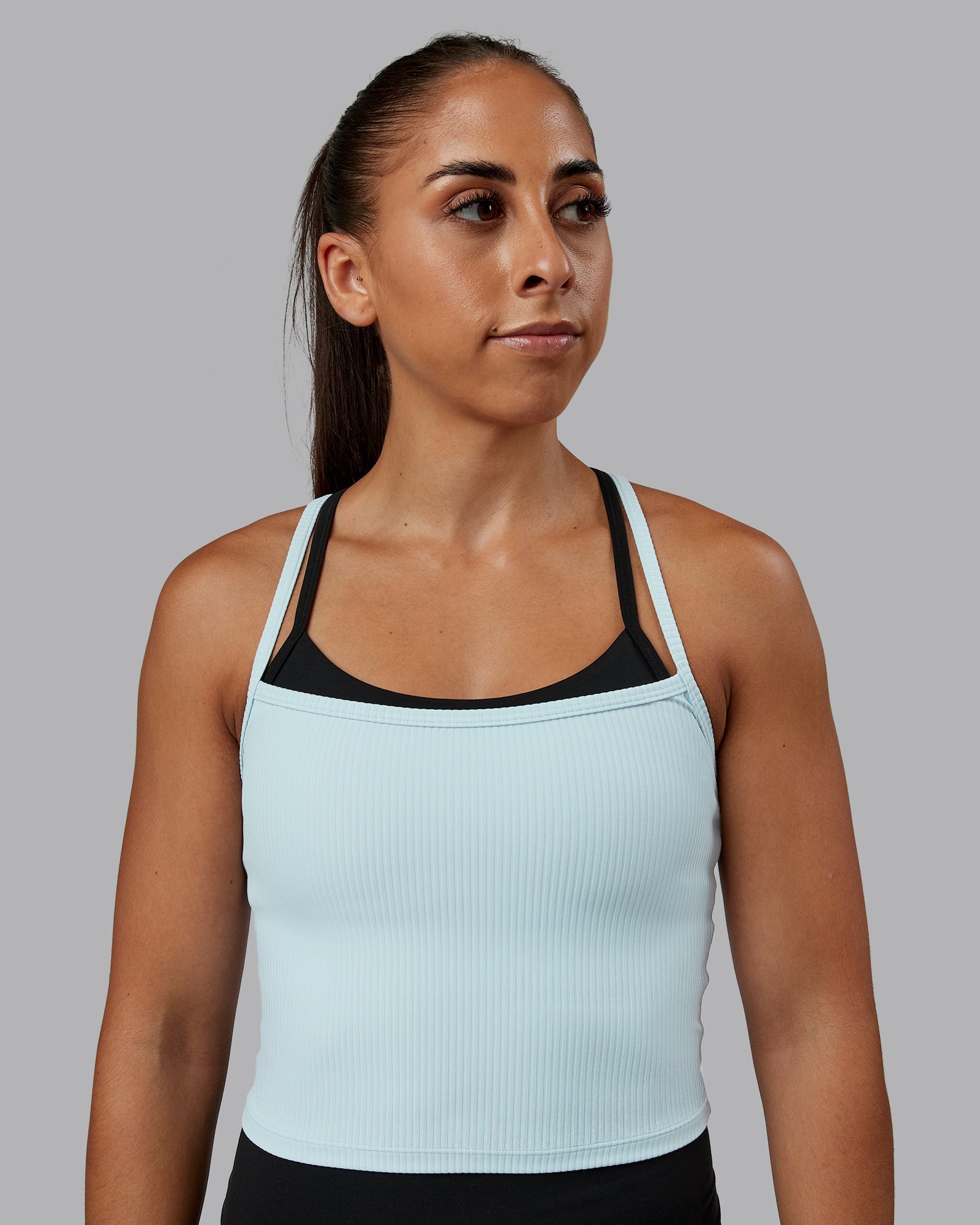 Woman wearing Flame Ribbed Tank in Skyride | Size:S | Model:Tylah
