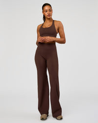 Woman wearing Flow Bonded Scoop Neck Sports Bra - Hot Chocolate | Model:Rosie | Size:S