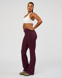 Woman wearing Flow Bonded Scoop Neck Sports Bra - White | Model:Rosie | Size:S