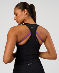 Woman wearing Flow Graphic Performance Tank 2.0 - Black-Radiate | Model:Rosie | Size:S