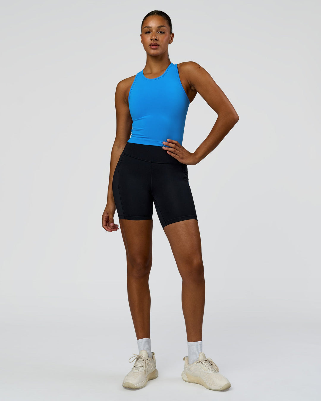 Woman wearing Flow Performance Tank 2.0 - Palace Blue | Model:Rosie | Size:S