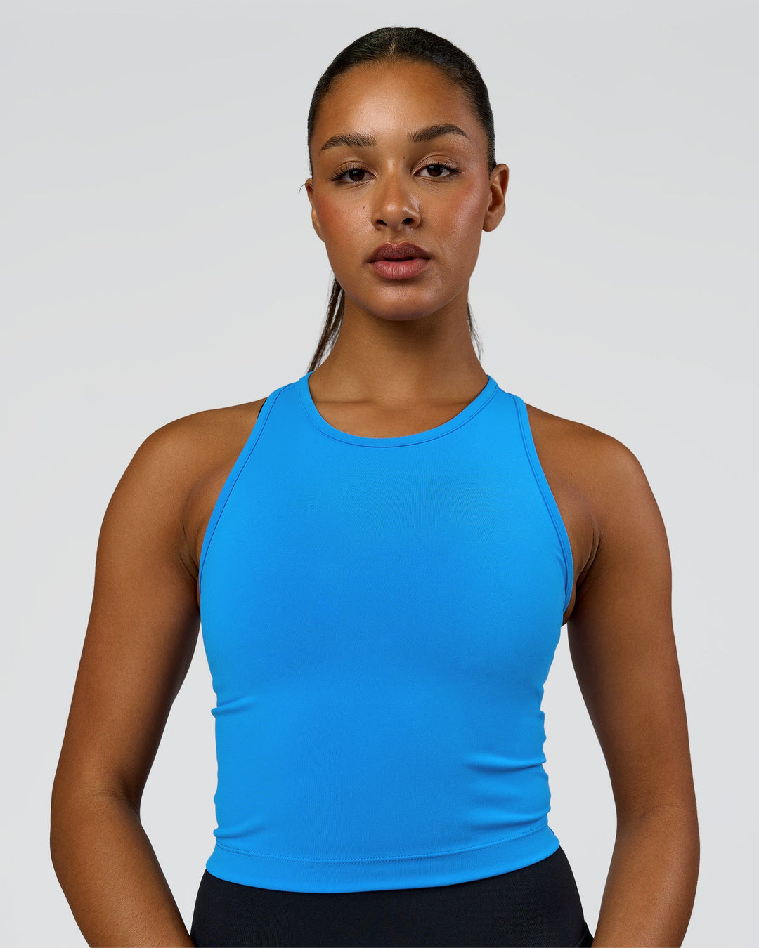 Woman wearing Flow Performance Tank 2.0 - Palace Blue | Model:Rosie | Size:S