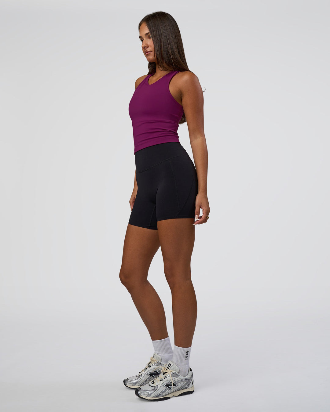 Woman wearing Flow Performance Tank 2.0 - Plum Caspia | Model:Bianca | Size:S