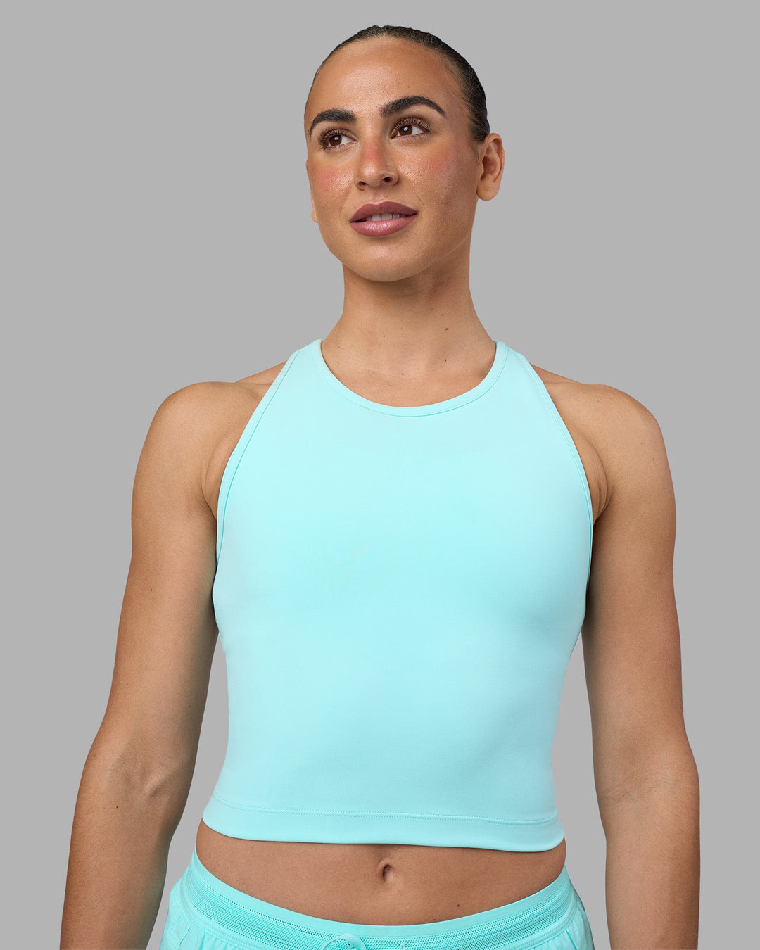 Woman wearing Flow Performance Tank 2.0 - Island Paradise | Model:Sophie | Size:S