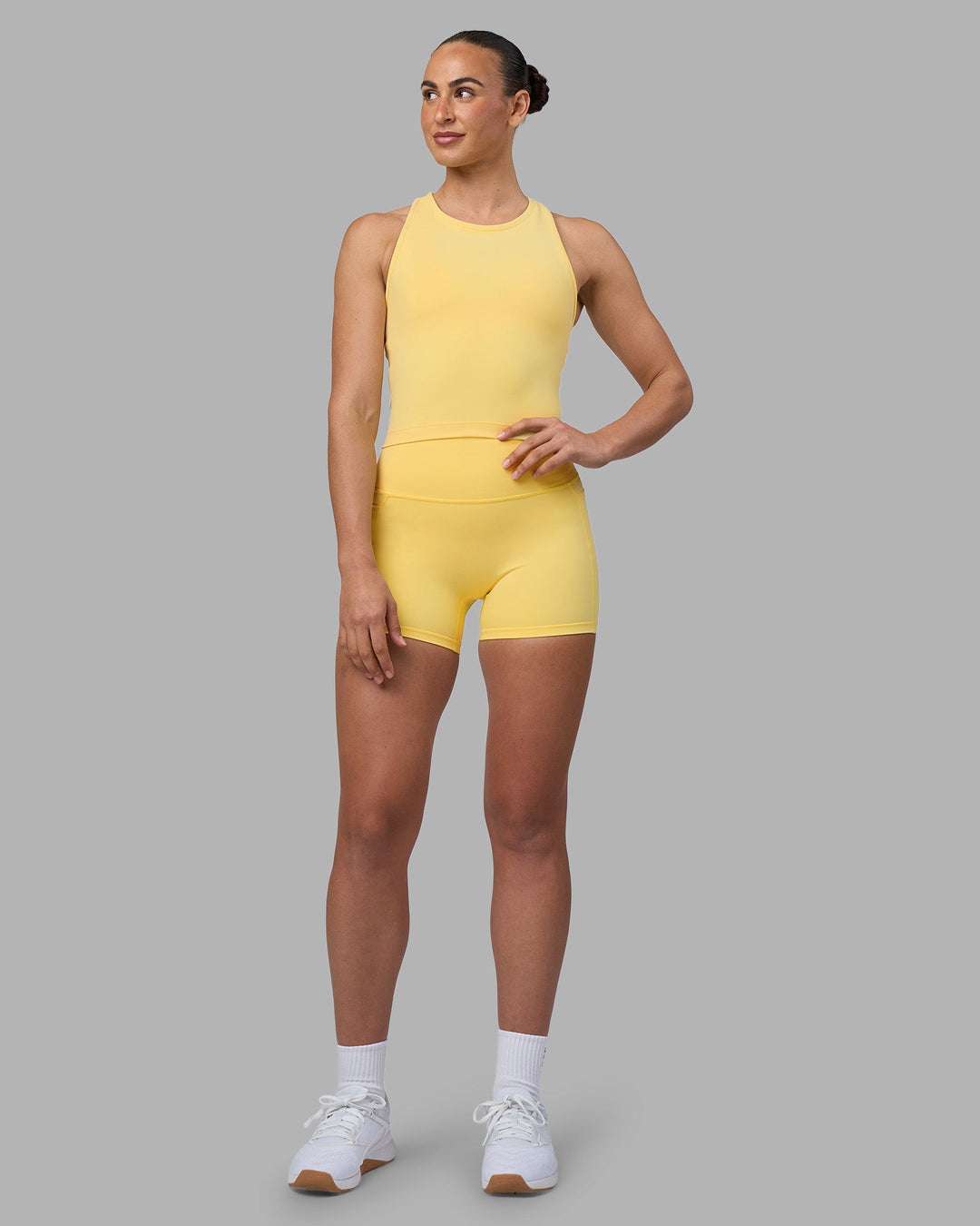 Woman wearing Flow Performance Tank 2.0 - Lemon | Model:Sophie | Size:S