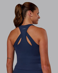 Woman wearing Flow Performance Tank - Future Navy | Model:Phoebe | Size:S