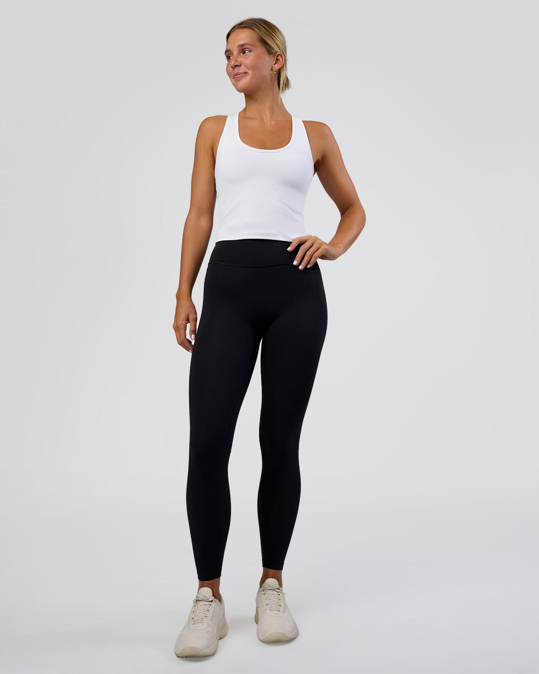 Woman wearing Flow Scoop Neck Performance Tank - White | Model:Amity | Size:S