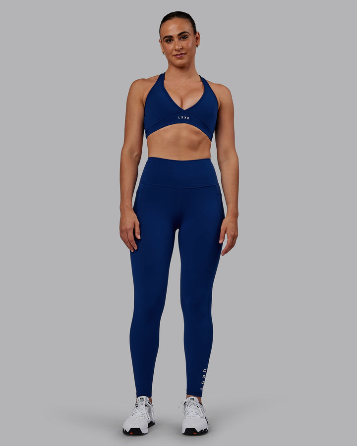 Woman wearing Flux Full Length Leggings - Midnight Blue
