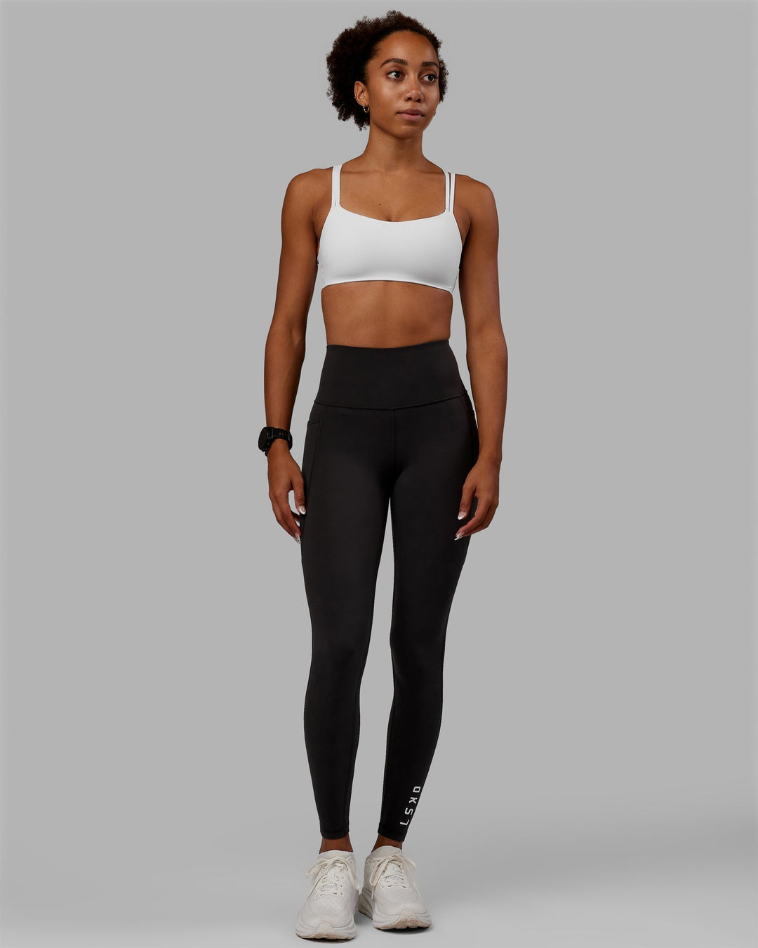 Woman wearing Flux Full Length Leggings - Pirate Black