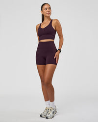 Woman wearing Function Longline Sports Bra - Midnight Plum | Model:Rhiley | Size:S | Thumbnail Index: 2