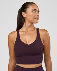 Woman wearing Function Longline Sports Bra - Midnight Plum | Model:Rhiley | Size:S | Thumbnail Index: 5