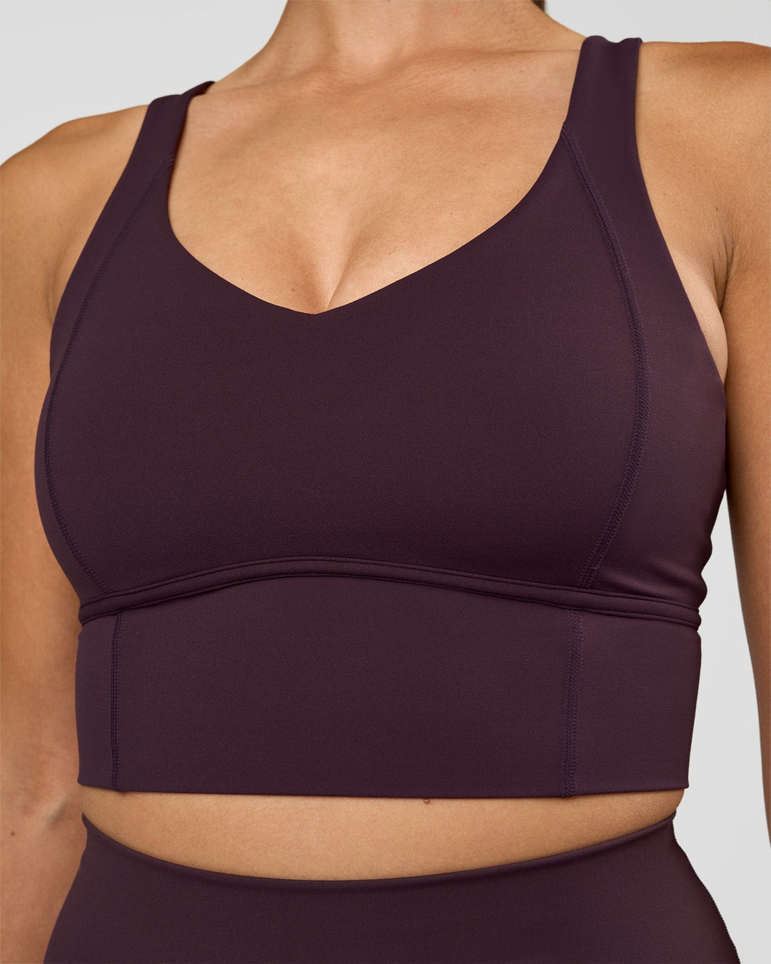 Woman wearing Function Longline Sports Bra - Midnight Plum | Model:Rhiley | Size:S - view 8