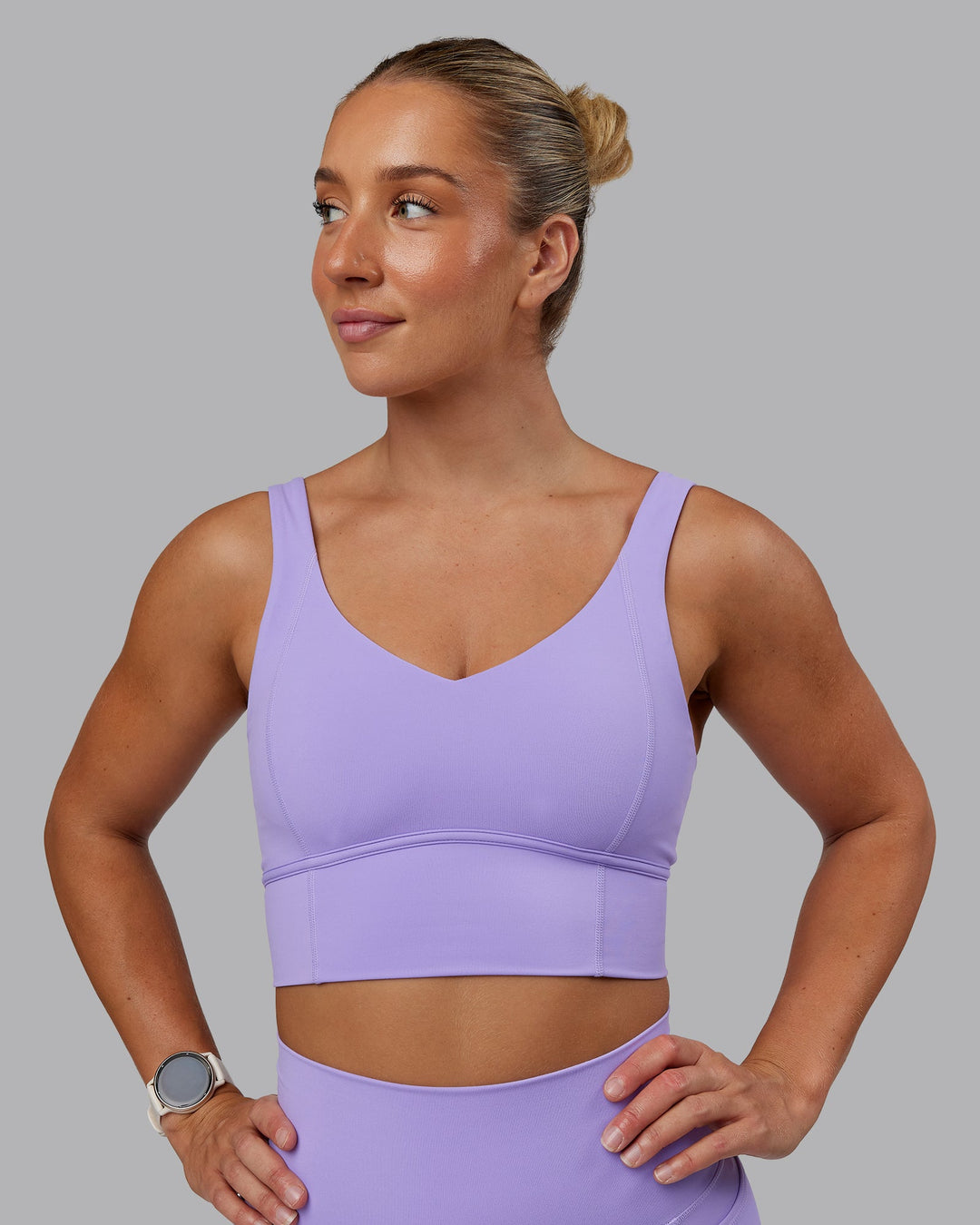 Woman wearing Function Longline Sports Bra in Violet Ray | Size:S