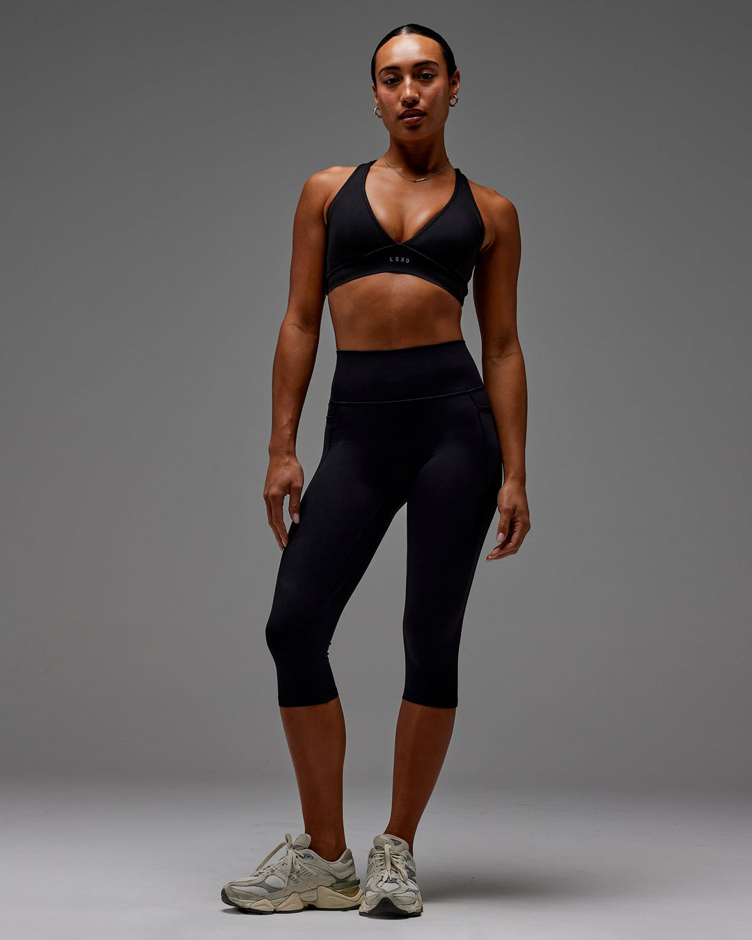 Woman wearing Fusion 3/4 Length Tight with Pockets in Black | Size:S