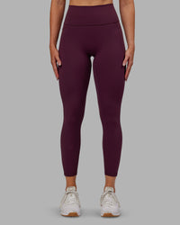 Woman wearing Fusion Ultra High-Rise 7/8 Legging Pockets - Cherry Lacquer | Model:Paris | Size:S | Thumbnail Index: 0