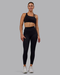 Woman wearing Fusion Ultra High-Rise 7/8 Legging - Black | Model:Hannah | Size:S