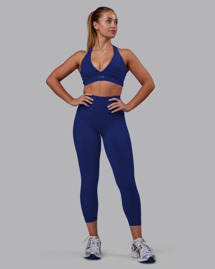 Woman wearing Fusion 7/8 Length Leggings - Midnight Blue
