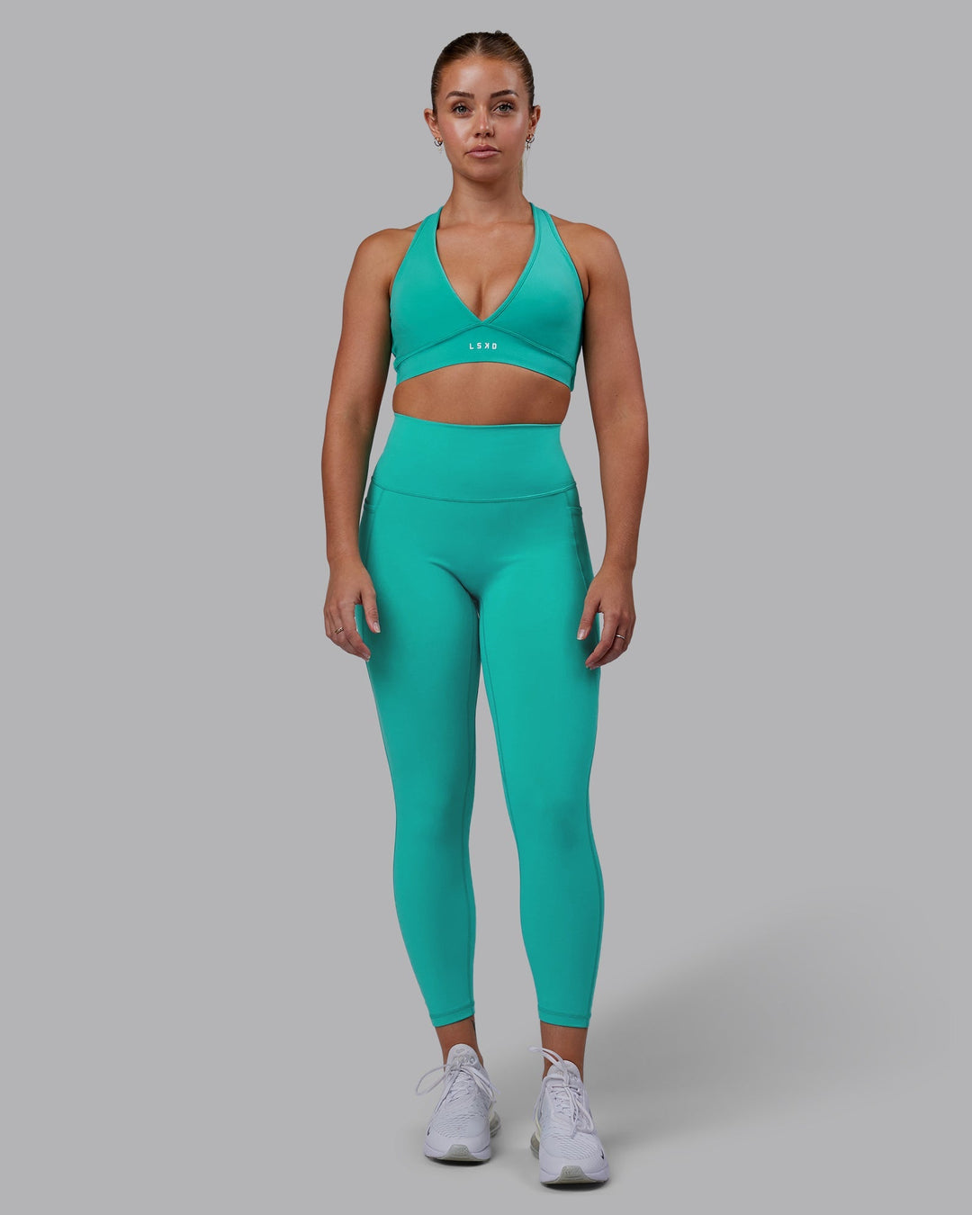 Woman wearing Fusion 7/8 Length Leggings - Turquoise Tide