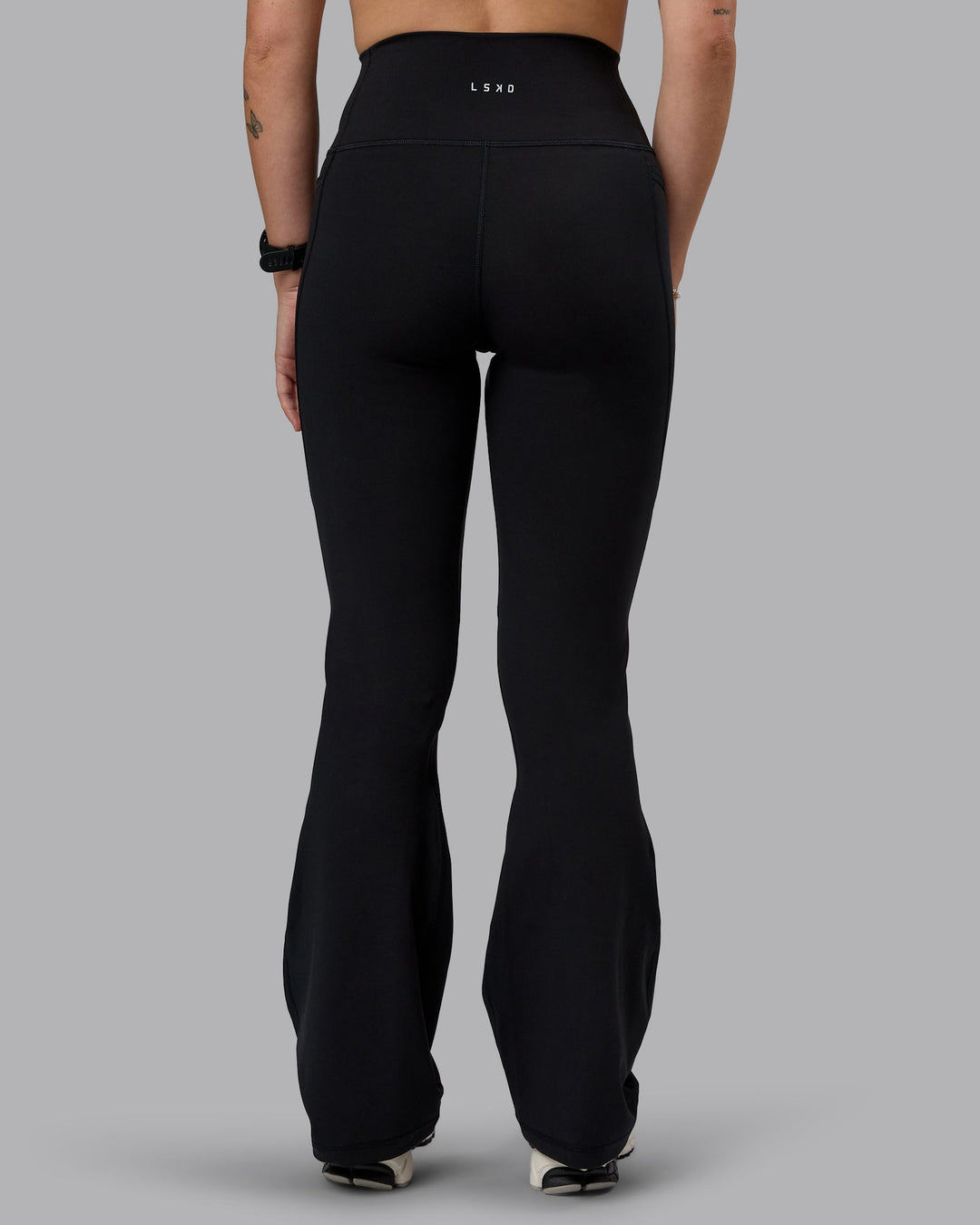 Woman wearing Fusion Everyday Flared Petite Tight With Pockets - Black| Model:Bianca | Size:S