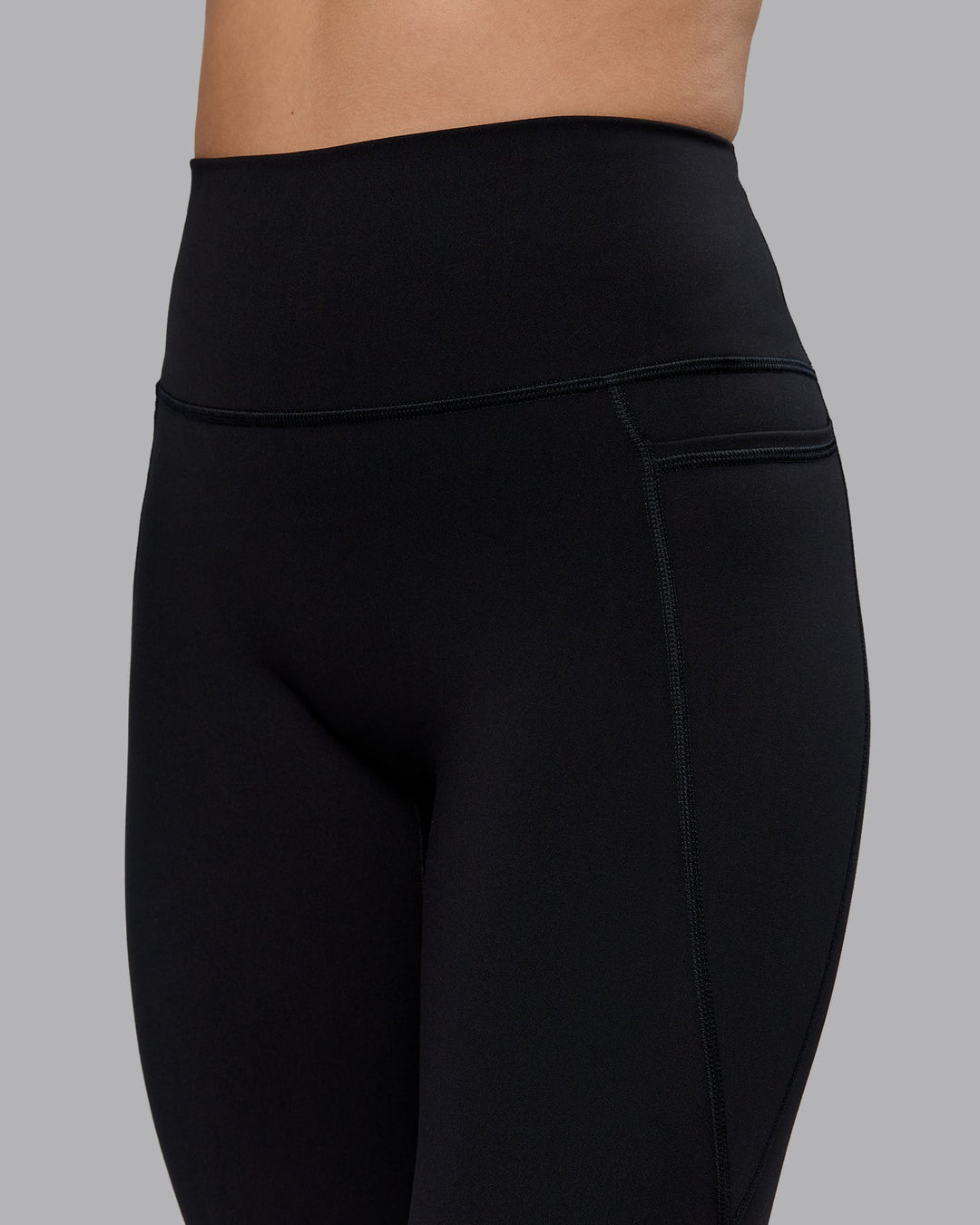 Woman wearing Fusion Everyday Flared Petite Tight With Pockets - Black| Model:Bianca | Size:S