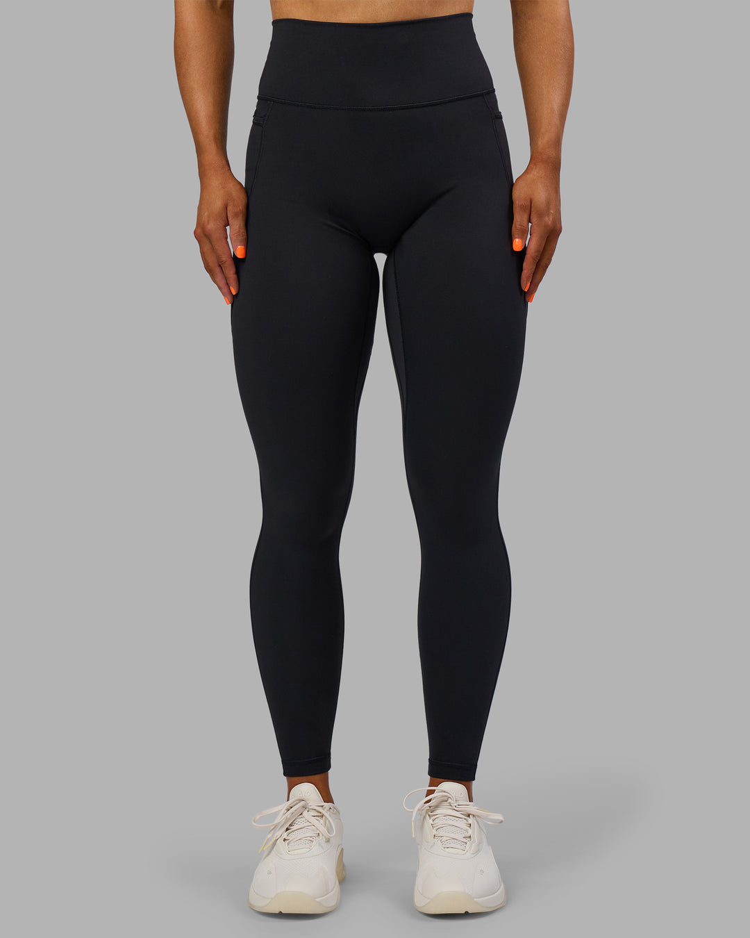 Woman wearing Fusion Ultra High-Rise Full Length Legging Pockets - Black | Model:Georgia | Size:S