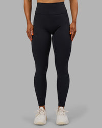 Woman wearing Fusion Ultra High-Rise Full Length Legging Pockets - Black | Model:Georgia | Size:S