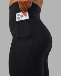Woman wearing Fusion Ultra High-Rise Full Length Legging Pockets - Black | Model:Georgia | Size:S