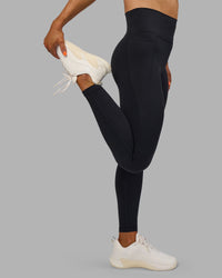 Woman wearing Fusion Ultra High-Rise Full Length Legging Pockets - Black | Model:Georgia | Size:S