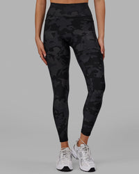 Woman wearing Fusion Ultra High-Rise Full Length Legging Pockets - Black Camo | Model:Katie | Size:S