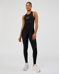 Woman wearing Fusion Graphic Ultra High-Rise Full Length Legging Pockets - Black-Radiate | Model:Rosie | Size:S