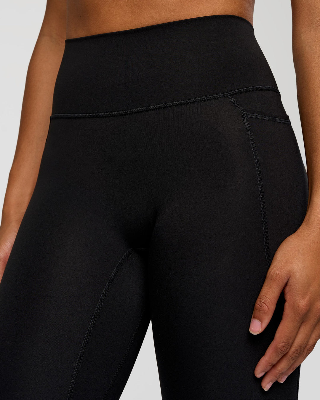 Woman wearing Fusion Graphic Ultra High-Rise Full Length Legging Pockets - Black-Radiate | Model:Rosie | Size:S