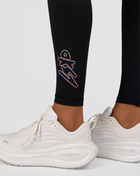 Woman wearing Fusion Graphic Ultra High-Rise Full Length Legging Pockets - Black-Radiate | Model:Rosie | Size:S