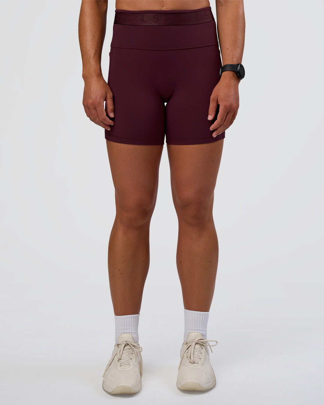 Woman wearing Fusion Jacquard High-Rise 6&quot; Short Pockets - Cherry Lacquer | Model:Sav | Size:S