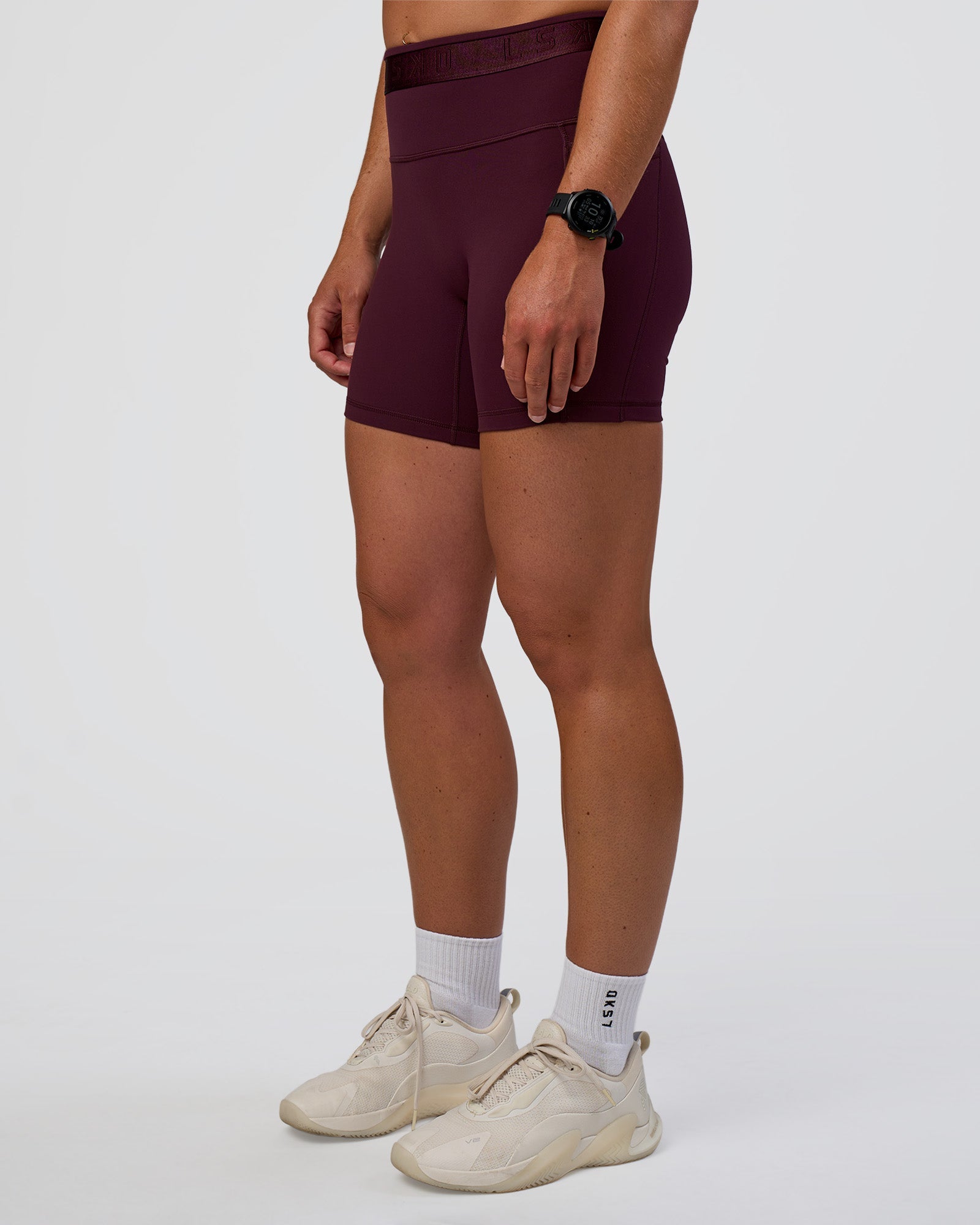 Woman wearing Fusion Jacquard High-Rise 6" Short Pockets - Cherry Lacquer | Model:Sav | Size:S